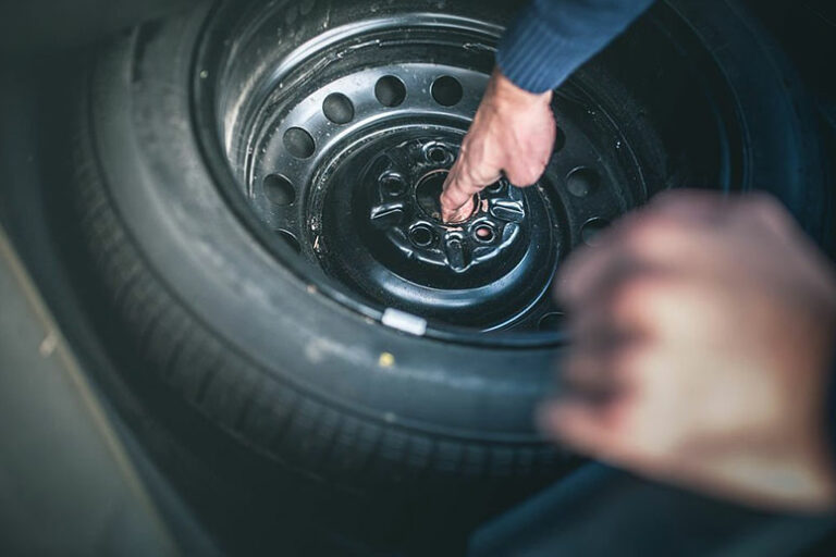 Water in Trunk Under Spare Tire: Causes and Solutions